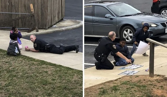 In 2019, A Virginia Police Officer Learned That Local Children Were Afraid Of Police, So Instead Of Simply Leaving After A Call, He Sat Down On The Sidewalk To Play Dolls And Draw With Them. The Children Later Began Calling Him Their “Superhero”