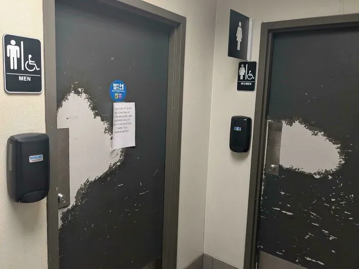Restrooms With Different Wear On Doors