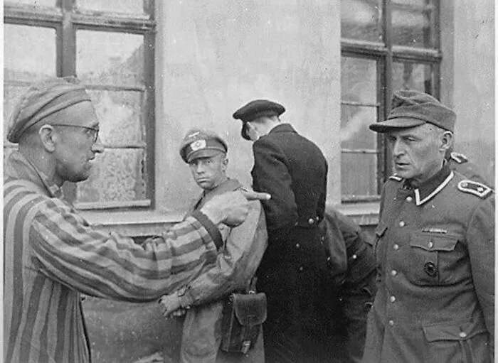 A Former Prisoner Points Out The Most Brutal Guard. Germany, 1945