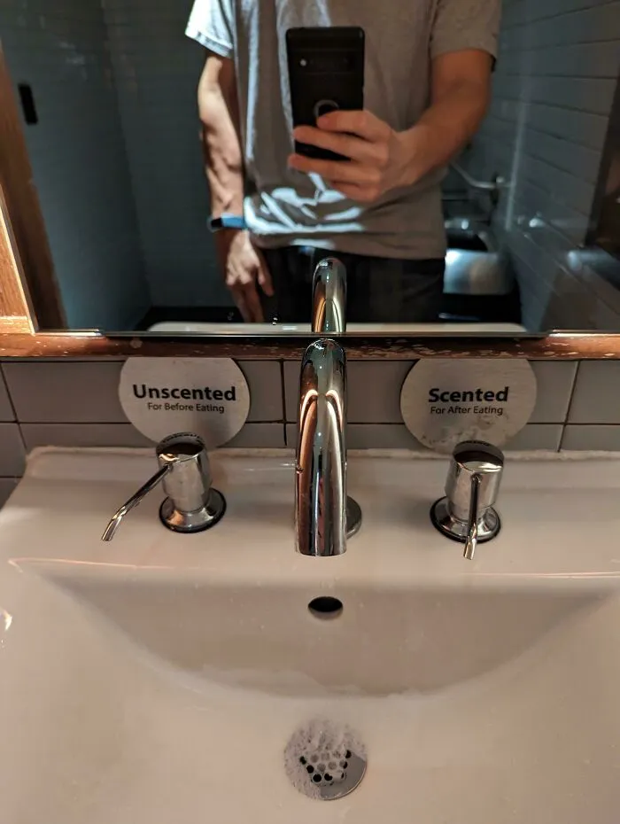This Restaurant Sink Has Two Soap Dispensers. One For Before Eating And One For After