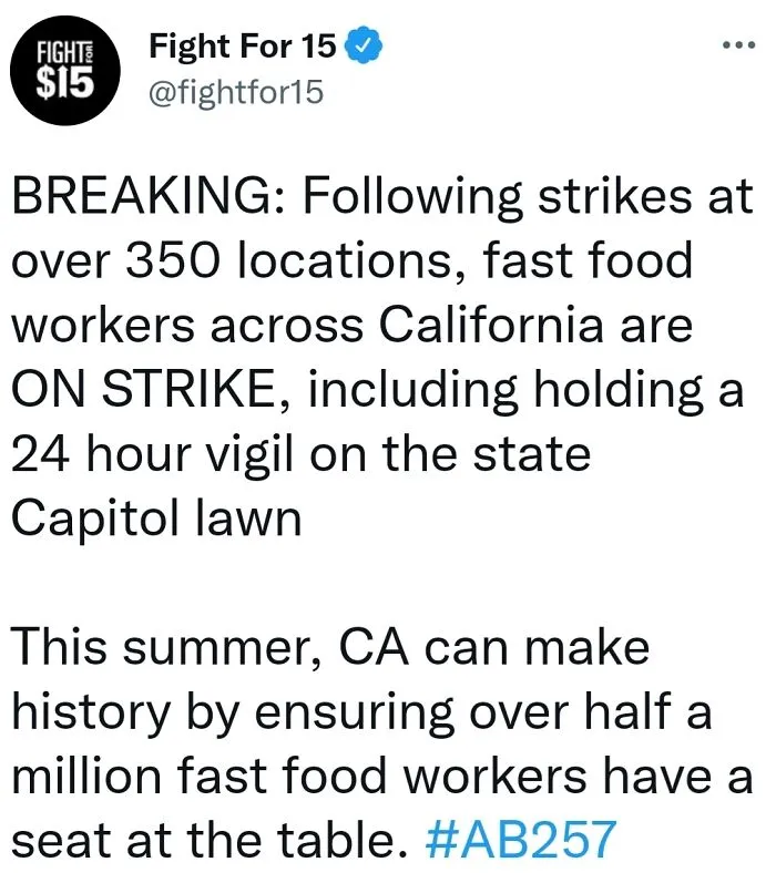 A tweet from Fight For 15 about fast food workers in California on strike, highlighting disturbing levels of dystopia in the USA.