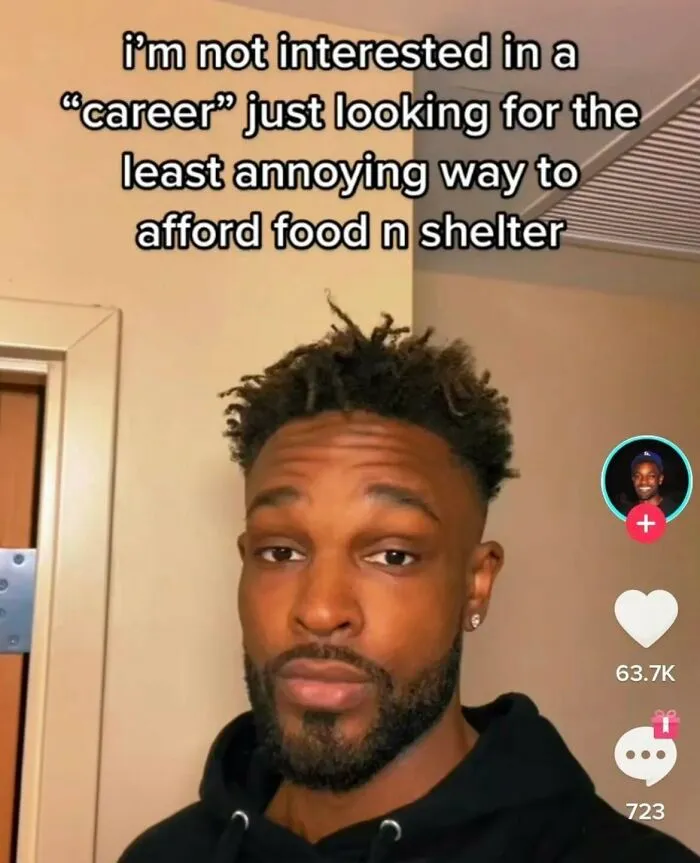 A man on a social media screen with text expressing disinterest in a career, highlighting the disturbing levels of dystopia in the USA.