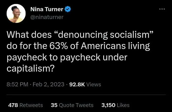 Nina Turner's tweet highlights the USA's disturbing dystopia, questioning socialism's denunciation for paycheck-to-paycheck Americans.