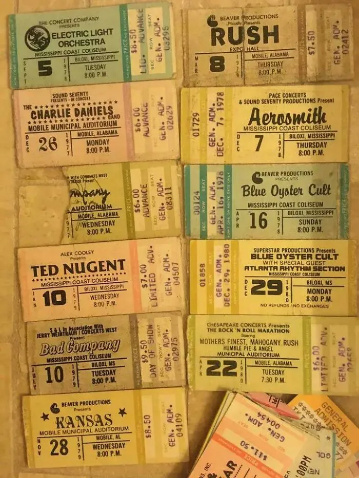 Collection of vintage concert tickets featuring iconic rock bands