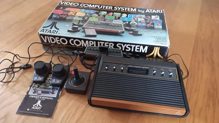 Atari Video Computer System with joystick and manual, classic Gen X gaming