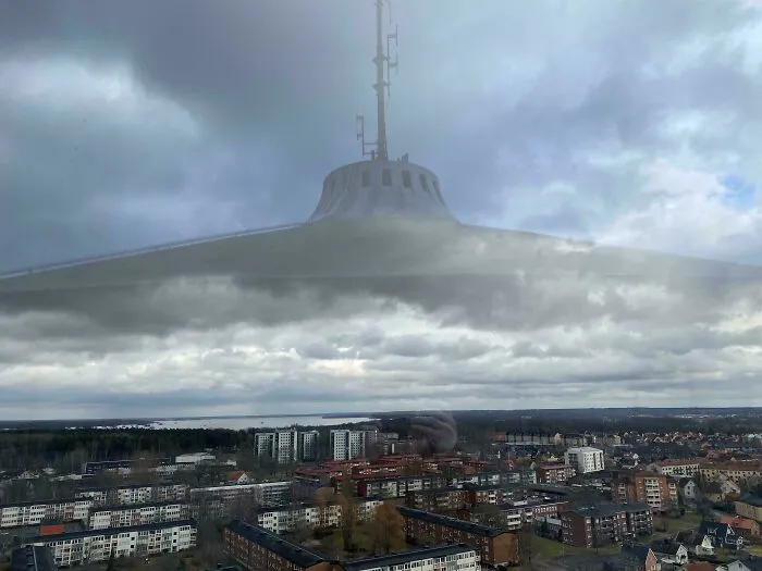 The Glass Reflection On Top Of The Örebro Water Tower Looks Like A UFO Is Approaching