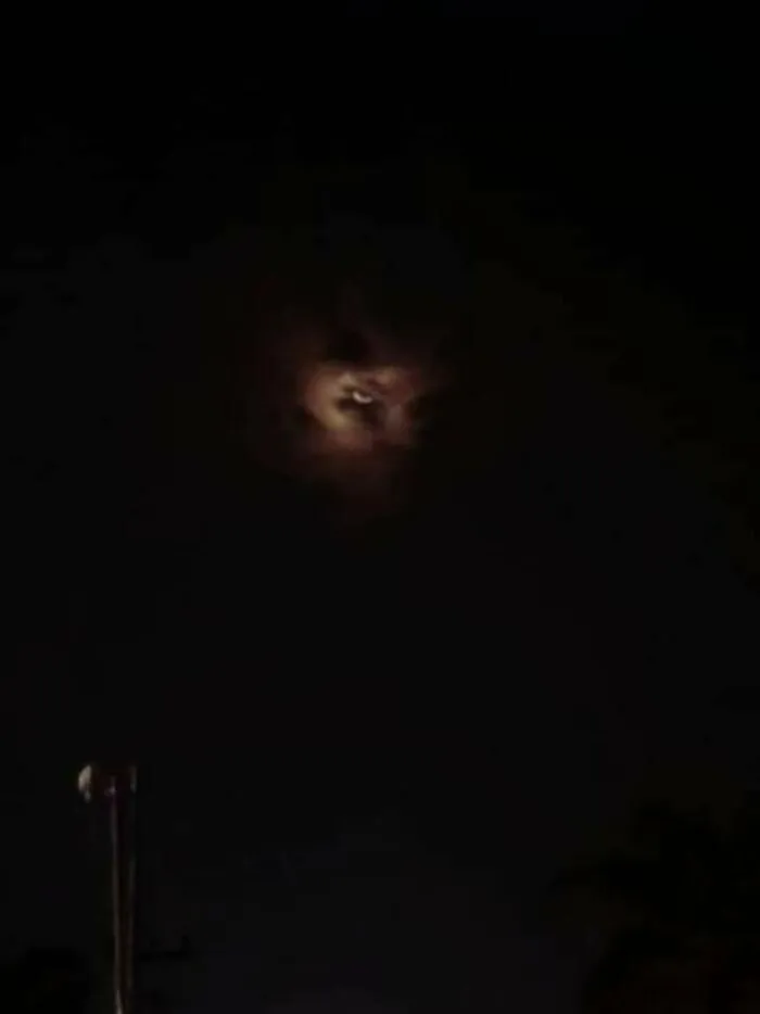Clouds And Moon Look Like Creepy Face