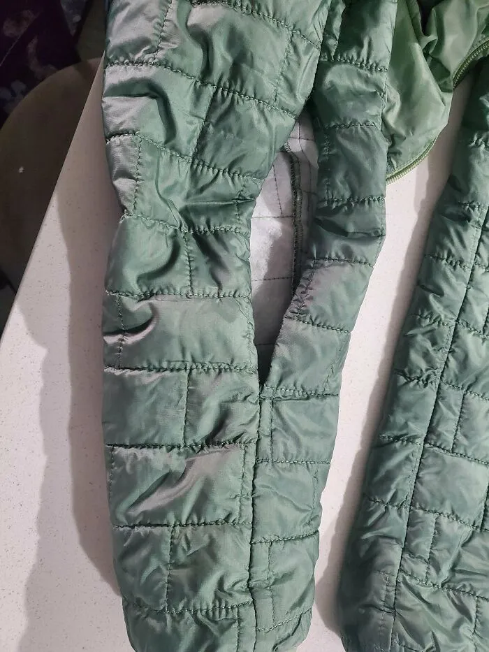 Patagonia Jacket Sleeve Ripped Open After Less Than A Month Of Light Use.  Given How The Seam Was Stitched, It's No Mystery Why