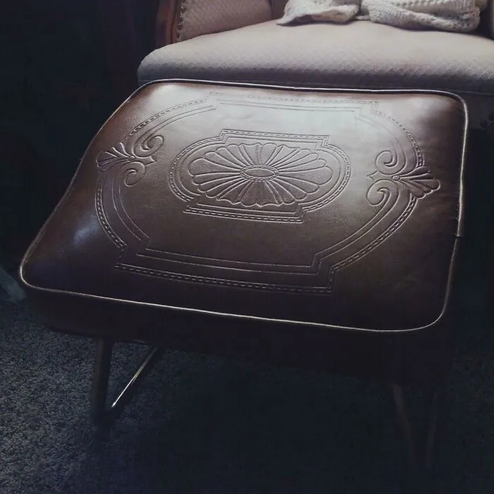 Vintage brown leather footstool, cozy thrift store finds