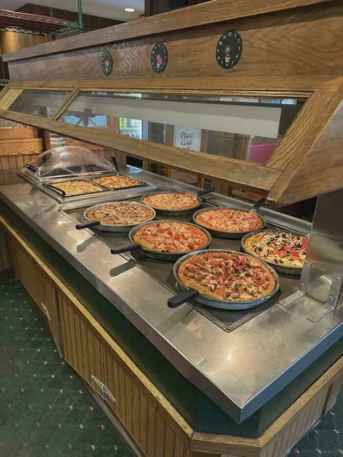 An old school pizza buffet bar showing nostalgic early 2000s vibes.