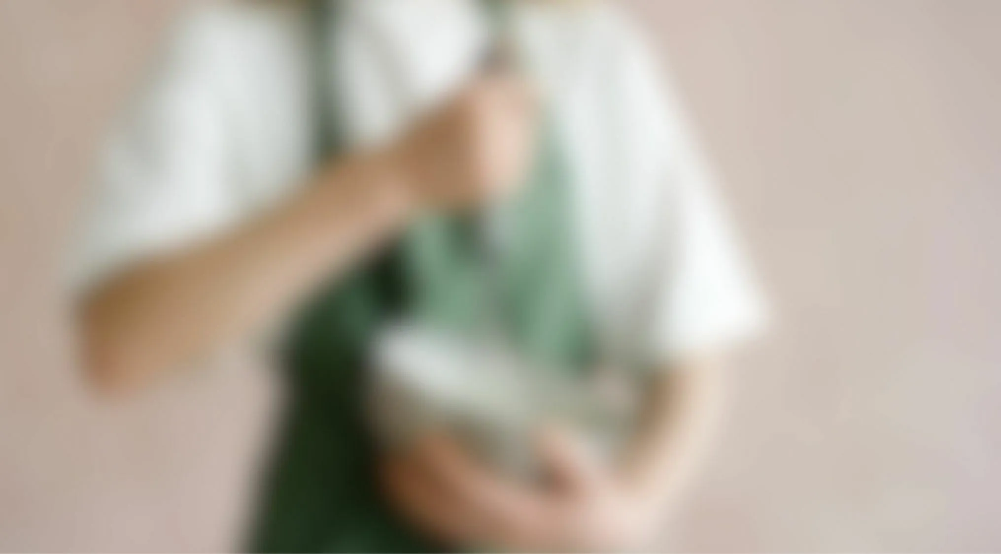Blurry images eyesight trivia quiz showing person holding kitchen bowl