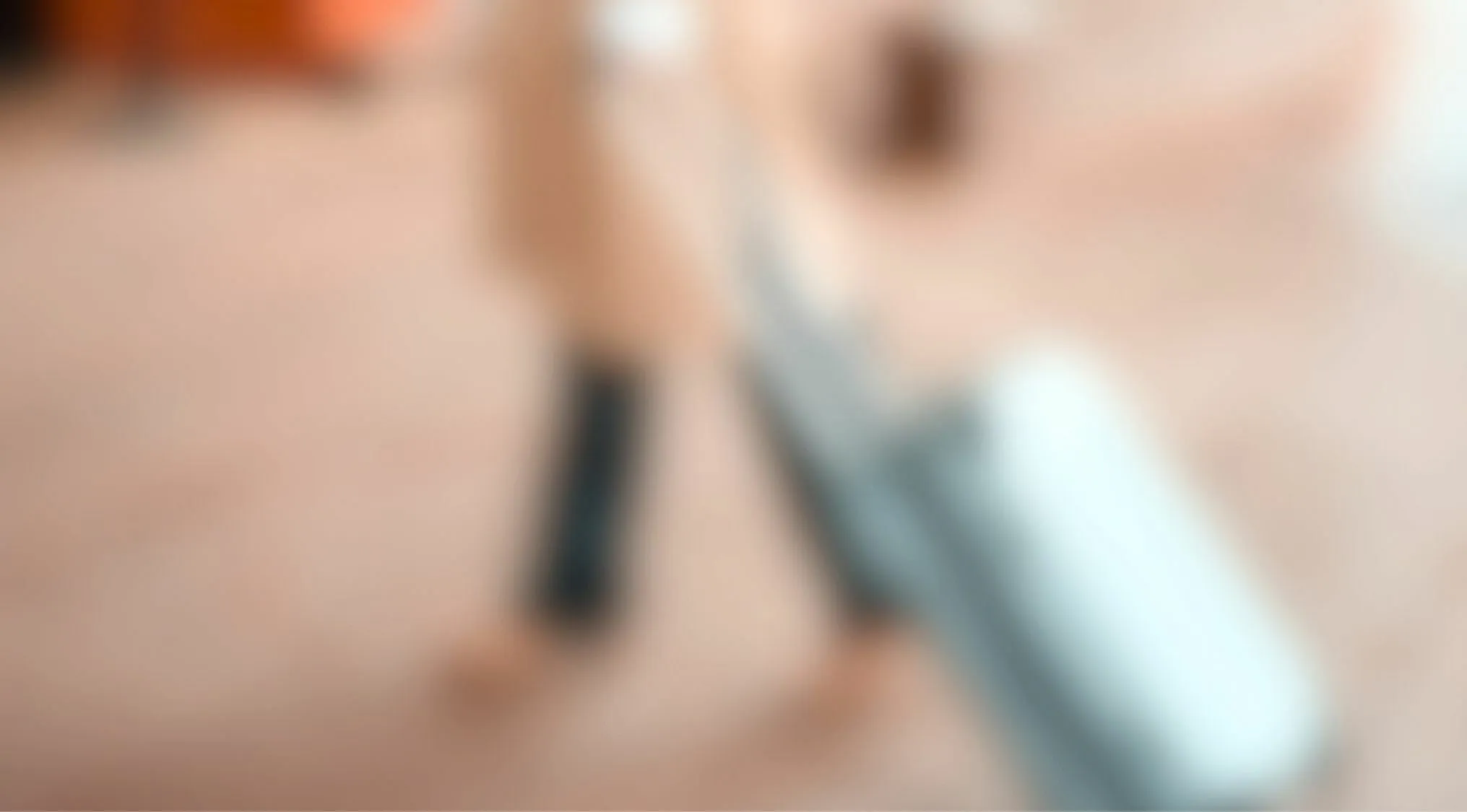 Blurred image showing a suitcase occupying most of the picture