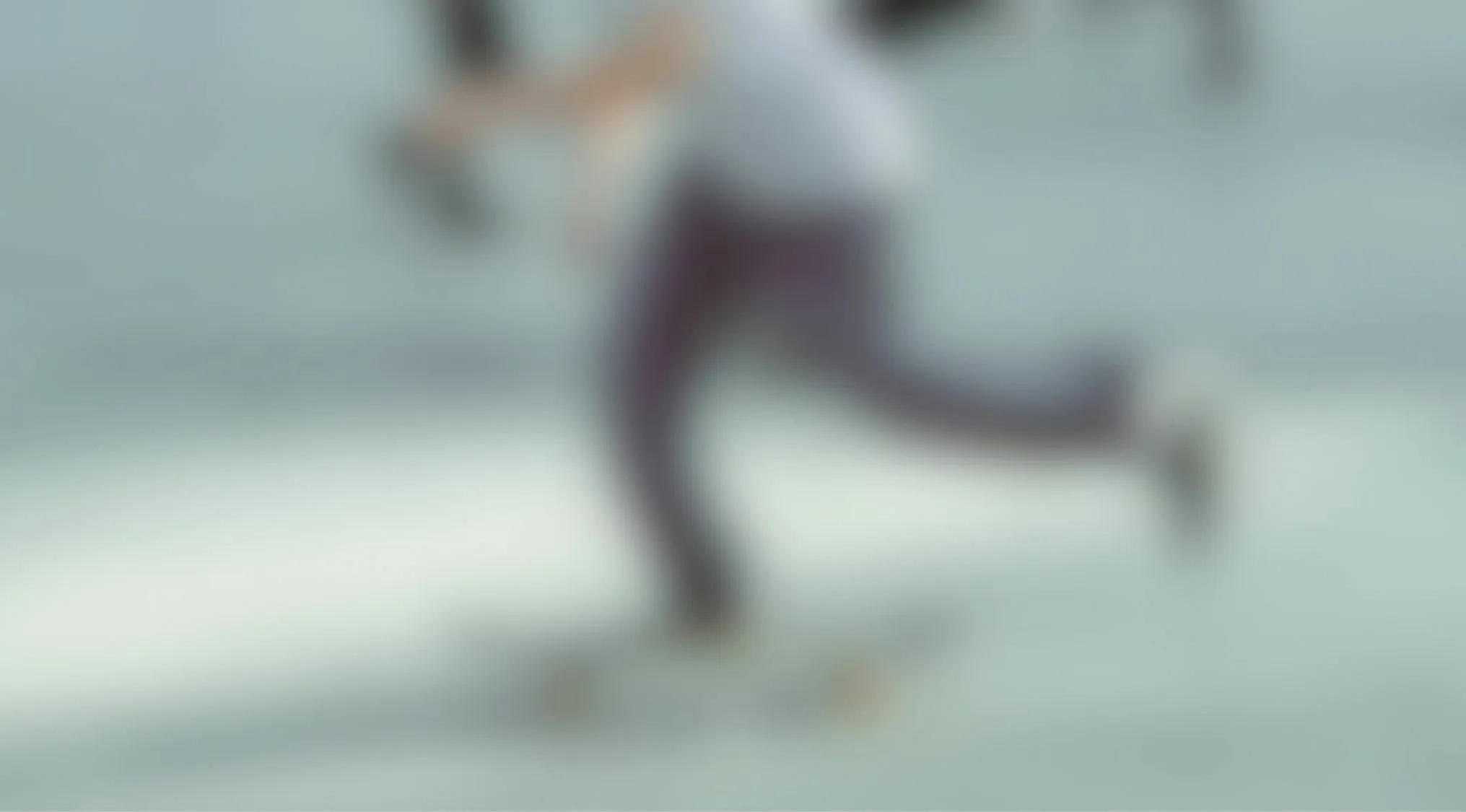 Blurry image of person on skateboard sports equipment quiz