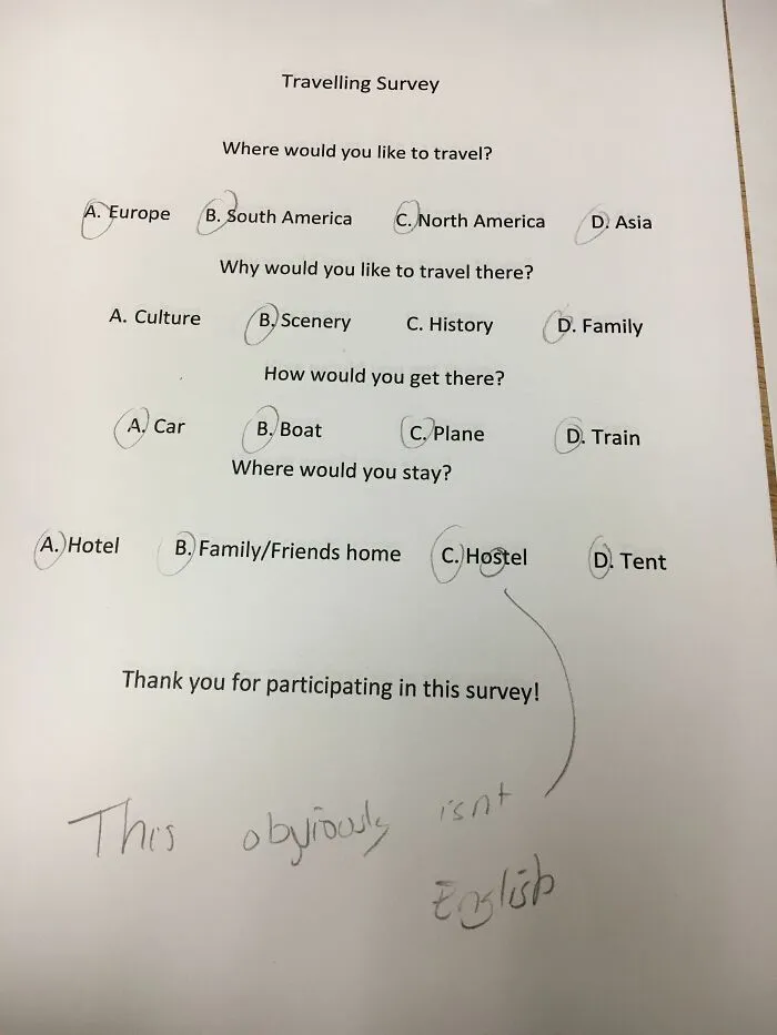 A travelling survey sheet where teachers marked a student's answer hostel with a note saying it isn't English.