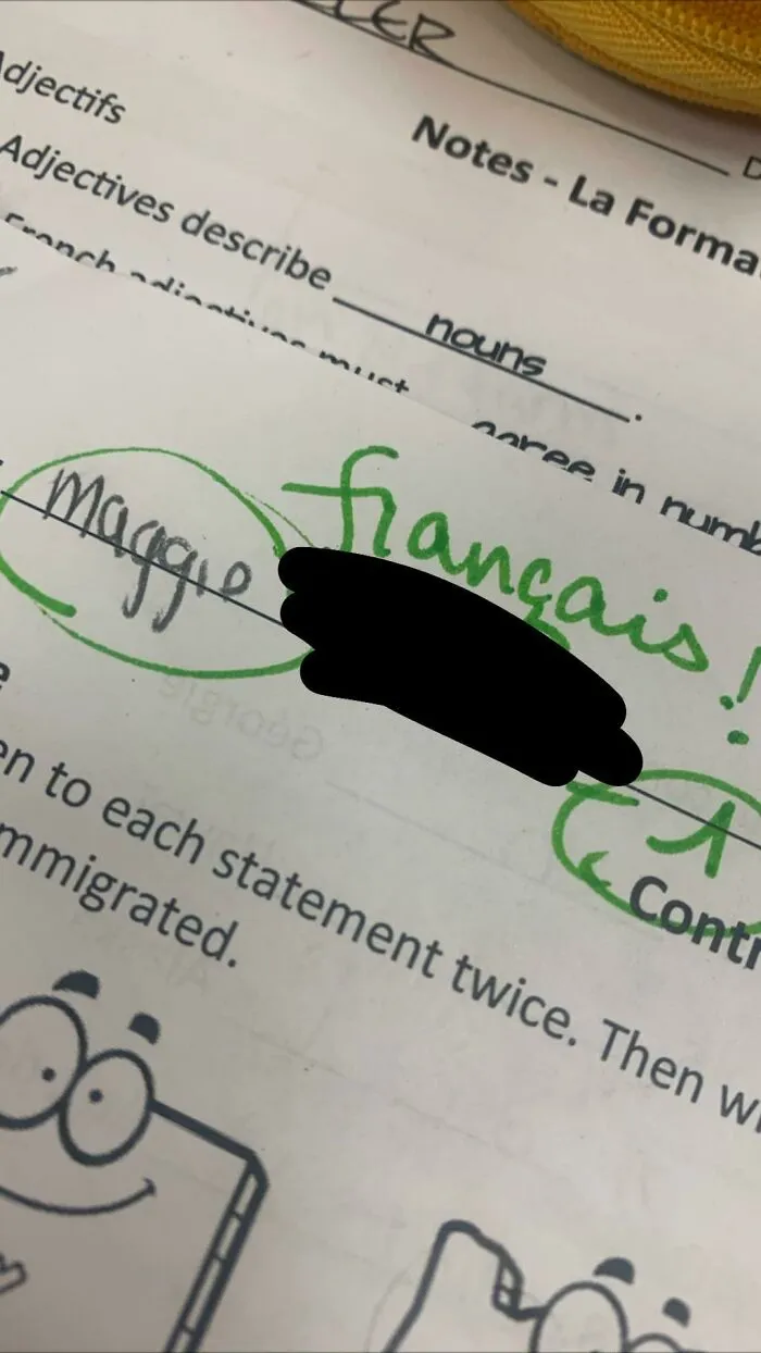 A French worksheet graded by strict teachers, correcting a minor error with a large green pen circle.