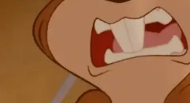 Extreme zoom-in of an angry Disney character with large buck teeth, perfect to guess the Disney character.