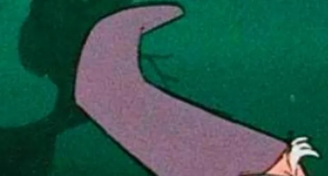An extreme zoom-in of a purple pointed hat against a green background to guess the Disney character.
