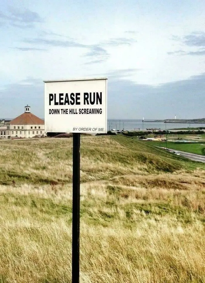 Hilarious sign asking to run down hill screaming by order of me