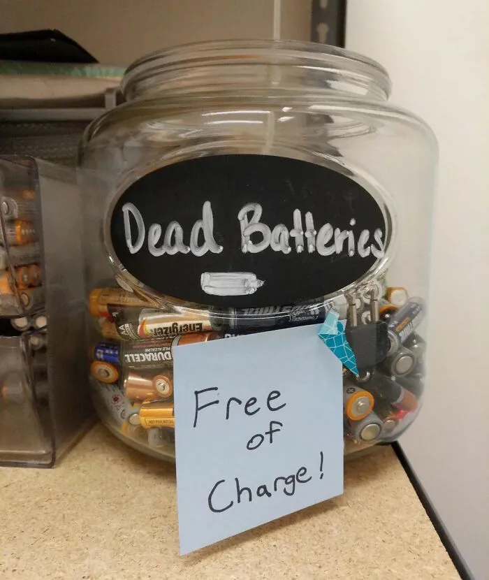 Jar labeled dead batteries with free of charge note
