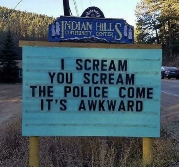 Community center sign with awkward police scream joke
