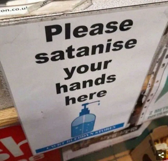 Unhinged sign asking to satanise hands with illustration of hand sanitizer