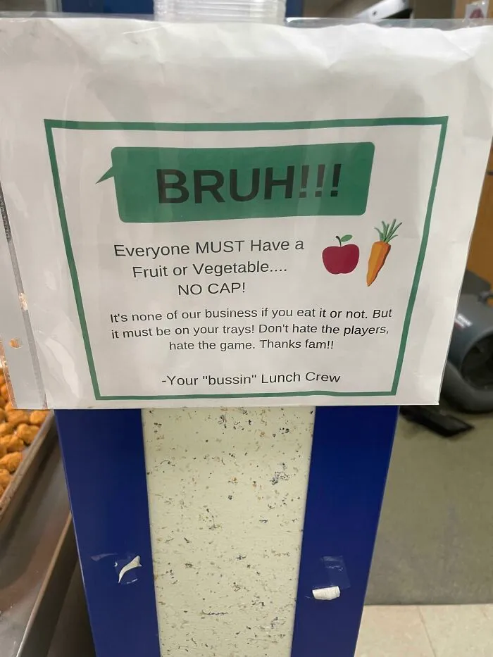 Humorous lunch sign requiring a fruit or vegetable on trays with playful language