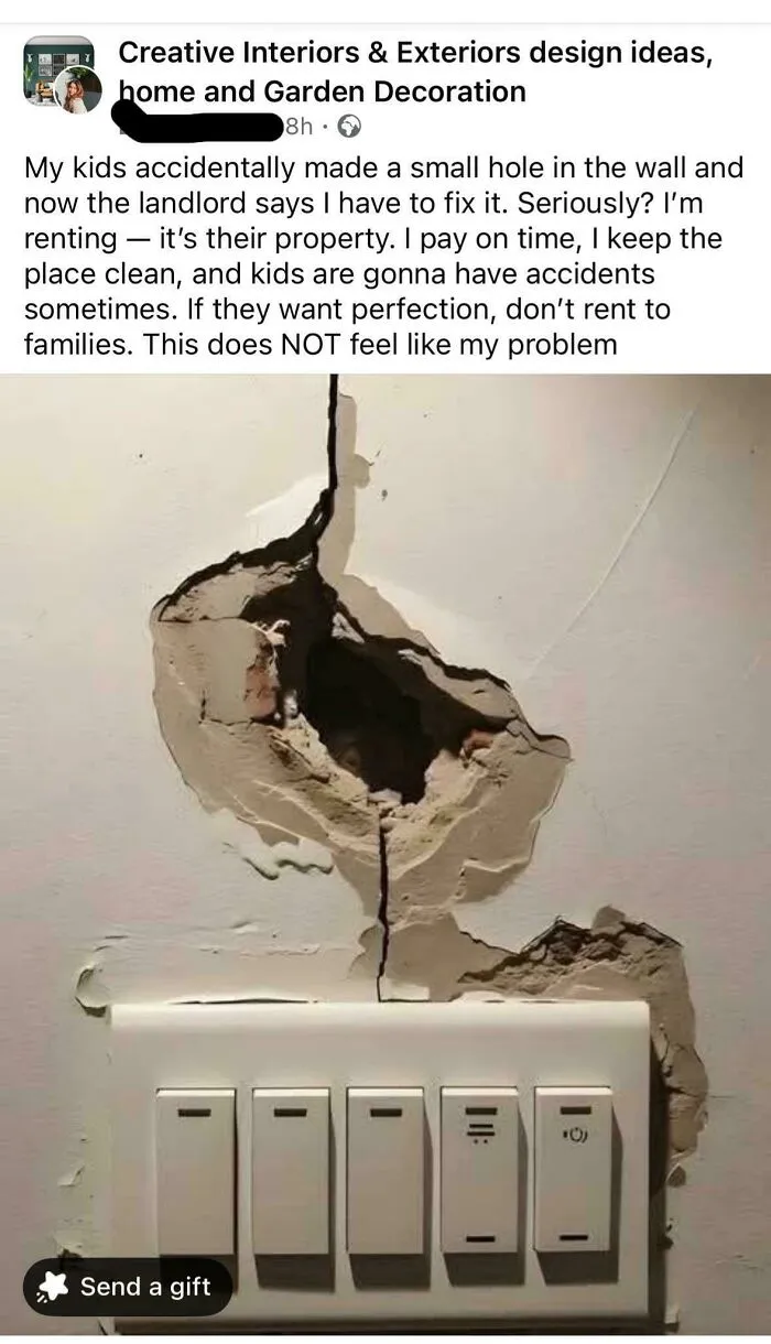 Large hole in a wall above light switches, demonstrating the main character lives mindset of a tenant.