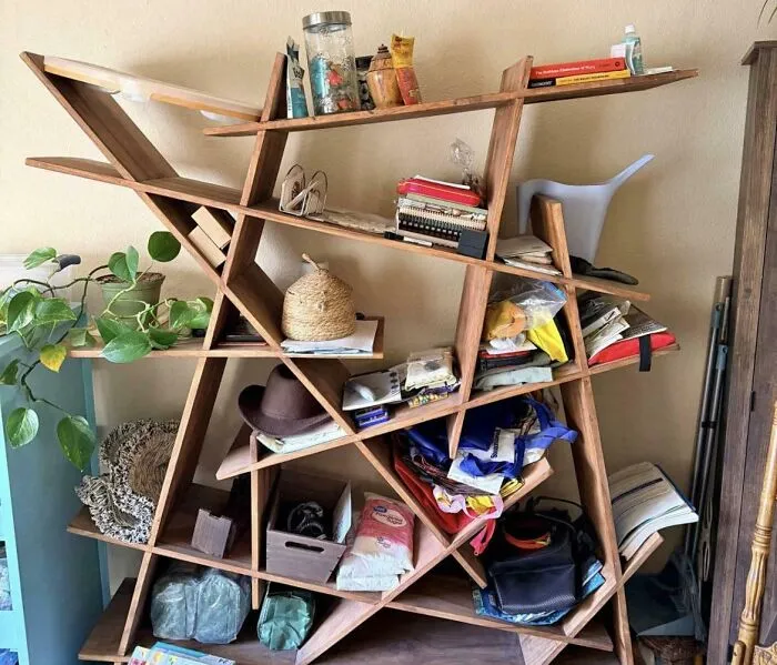 A chaotic and asymmetrical wooden shelf inside houses
