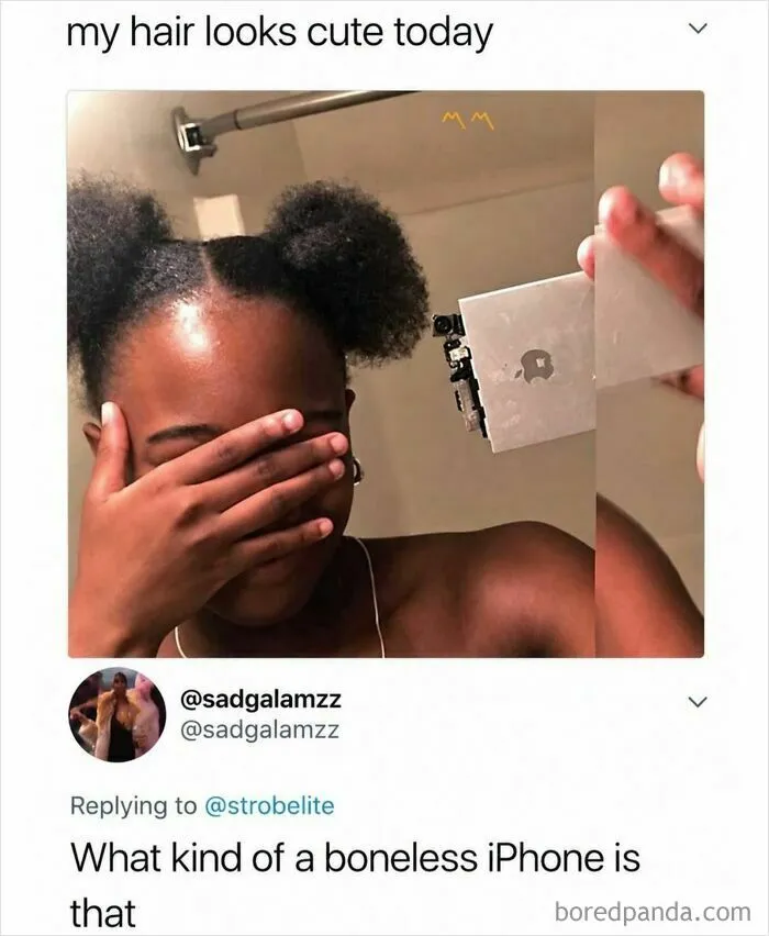 Person with puff hairstyle covering face taking selfie with a broken iPhone mirror case