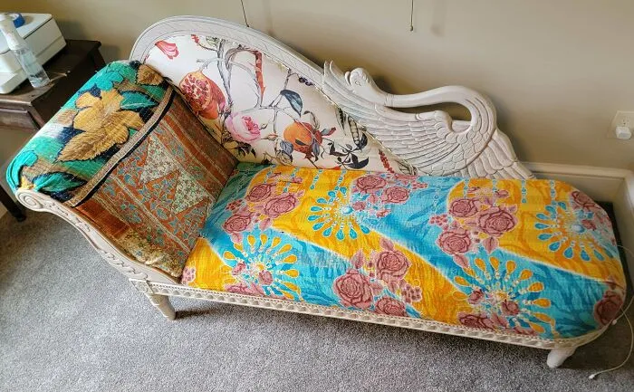 Decorative antique chaise lounge with floral upholstery found dumpster diving