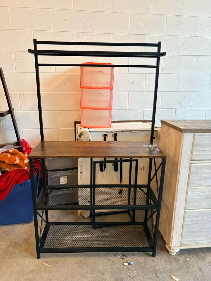 Metal and wood storage rack found as a dumpster diving find