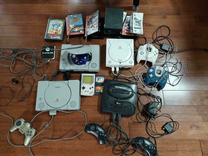 Vintage gaming consoles and cartridges found dumpster diving