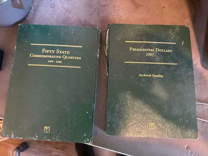 Coin collector folders for commemorative quarters and presidential dollars