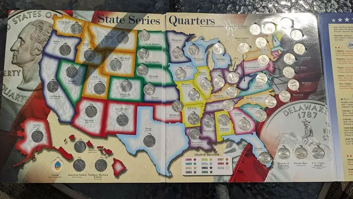 State series quarters coin collection layout found during dumpster diving
