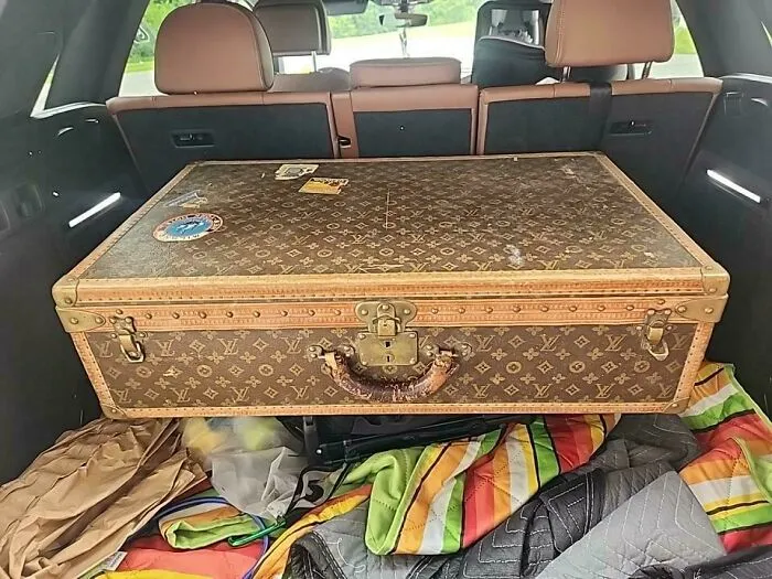 Vintage Louis Vuitton suitcase discovered in dumpster diving haul