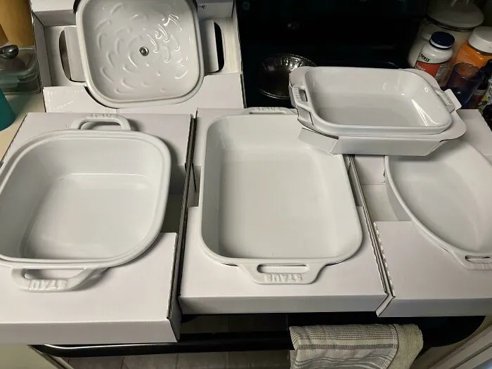 New white ceramic cookware set found while dumpster diving
