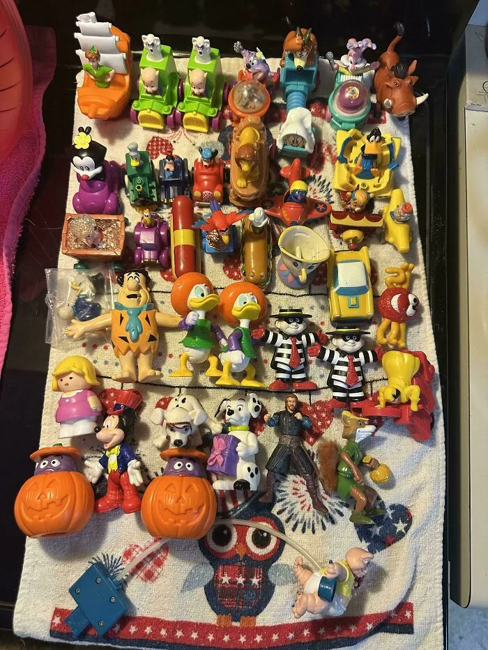 Collection of vintage cartoon character toys found dumpster diving