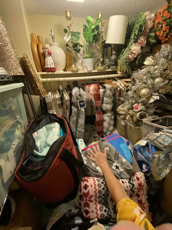 Closet full of found clothes and home decor from dumpster diving