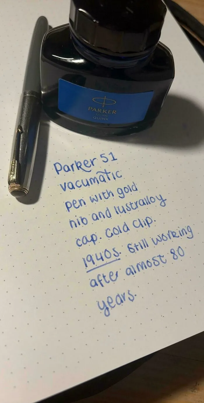 Vintage Parker fountain pen next to ink bottle and handwritten note showcasing old products that last.