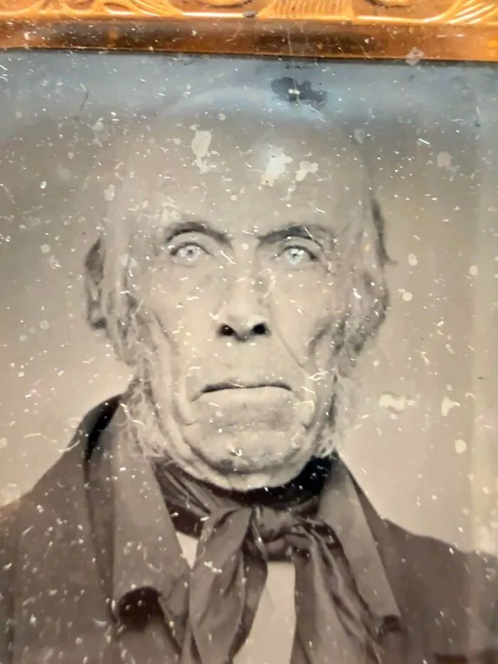 Antique daguerreotype portrait photograph of an elderly man, a fascinating piece among old treasures.