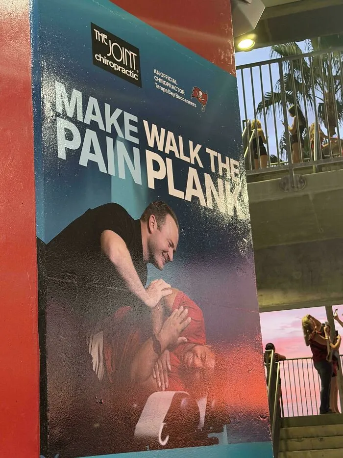 Poster with confusing text alignment demonstrating badly designed signs for chiropractic care.