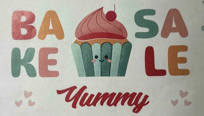 Colorful cupcake artwork with split text BAKESALE, an example of badly designed signs on a poster.