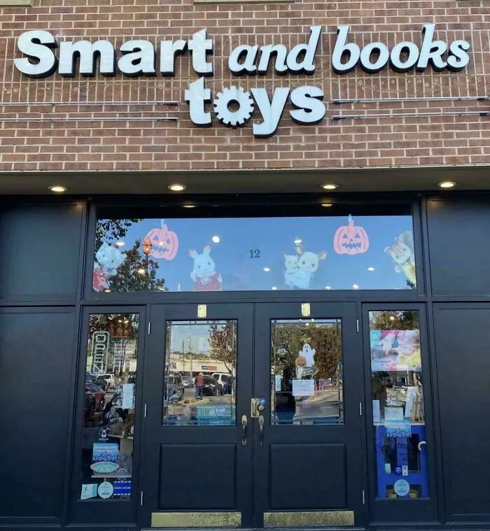 Storefront signage with confusingly arranged word order, showing badly designed signs.