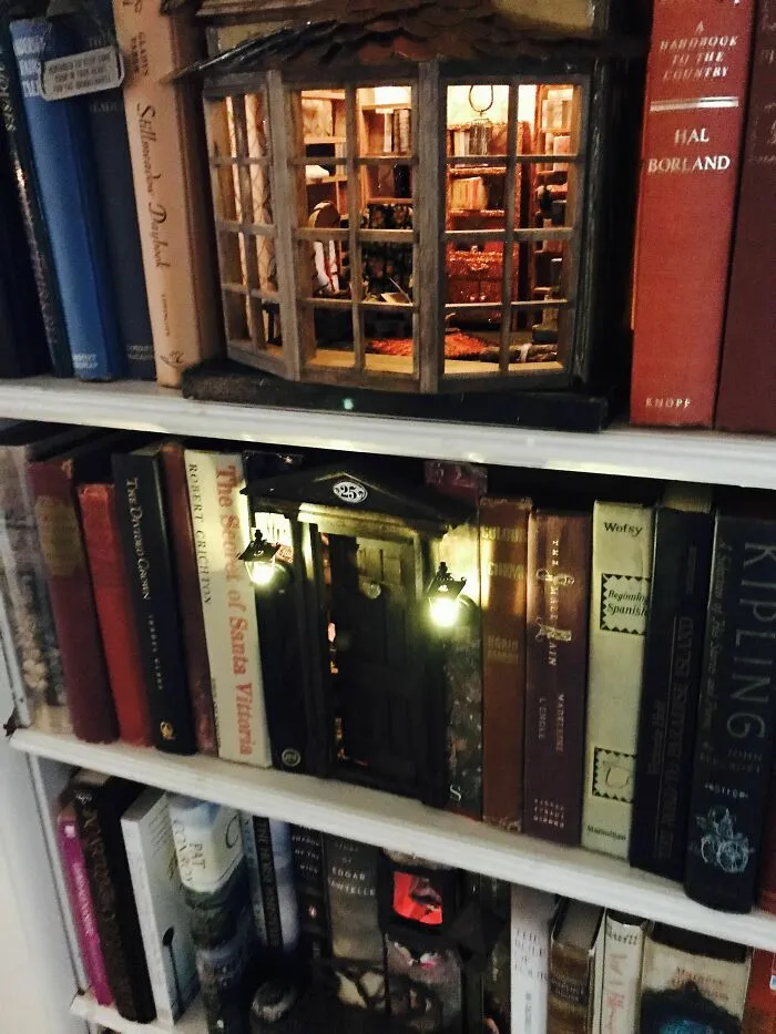 Two book nooks with warm lighting showing detailed rooms and doors on shelves