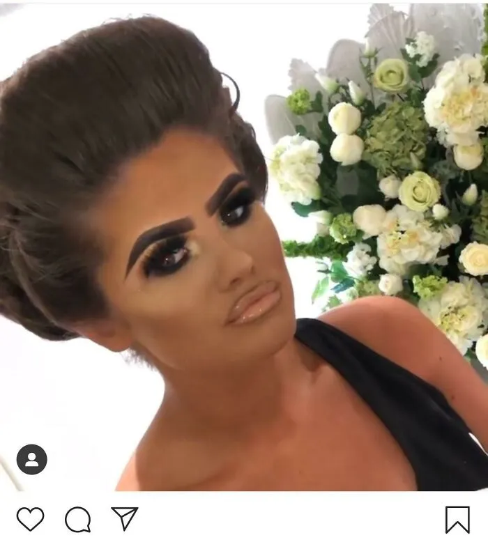Woman with overly dramatic dark block eyebrows highlighting beauty procedures fails