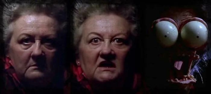 Large bulging eyes scare scene from a 90s classic movie