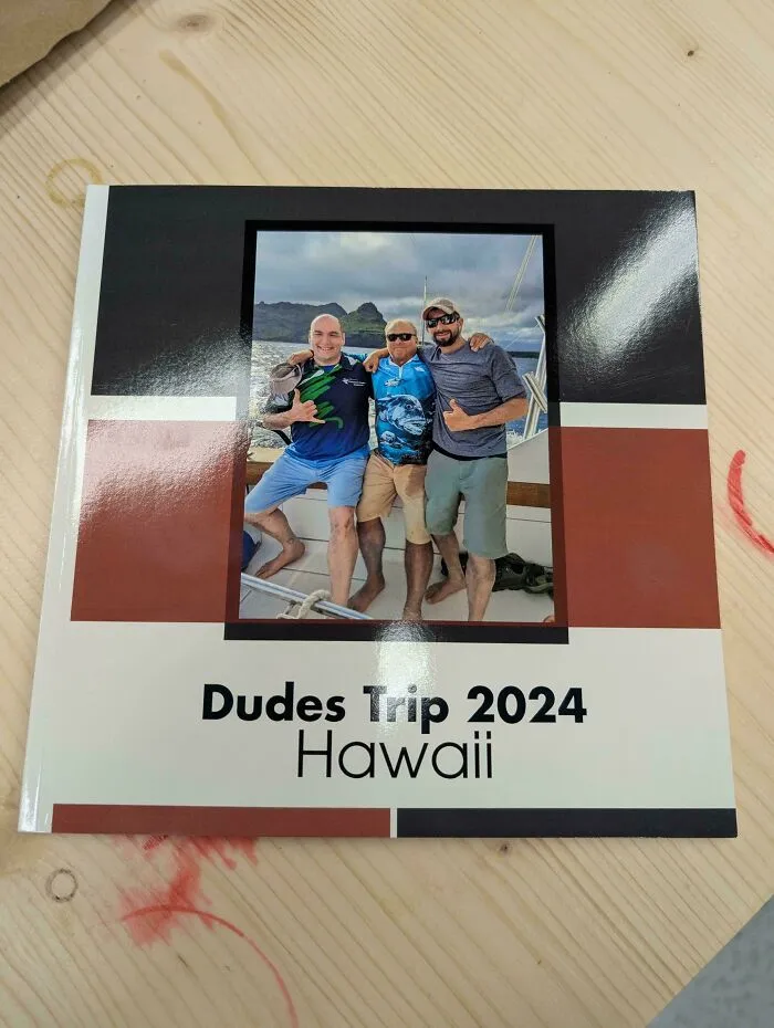 Cover of a custom photo book highlighting wholesome dads on a trip