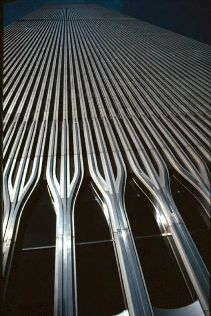 Low angle view of steel skyscraper columns representing architectural masterpieces in modern urban design