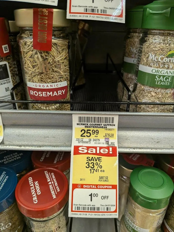 Spice jars with discount price tags display frugal tips for grocery savings