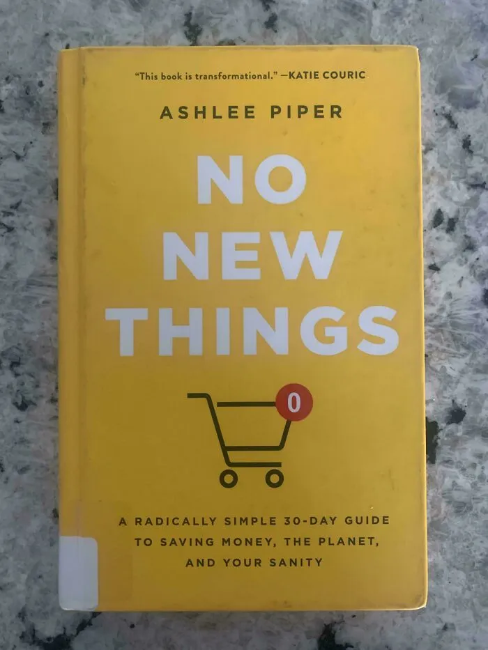 The cover of the yellow book No New Things by Ashlee Piper, offering smart frugal tips.